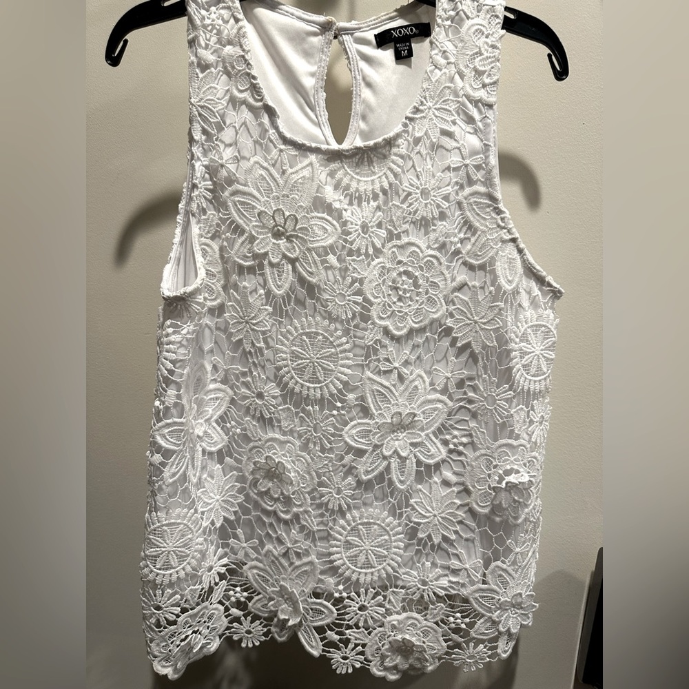 XOXO eyelet embroidered white top size M.  love this top!